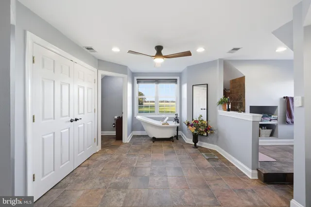 a view of a chairs and table on the wooden floor
