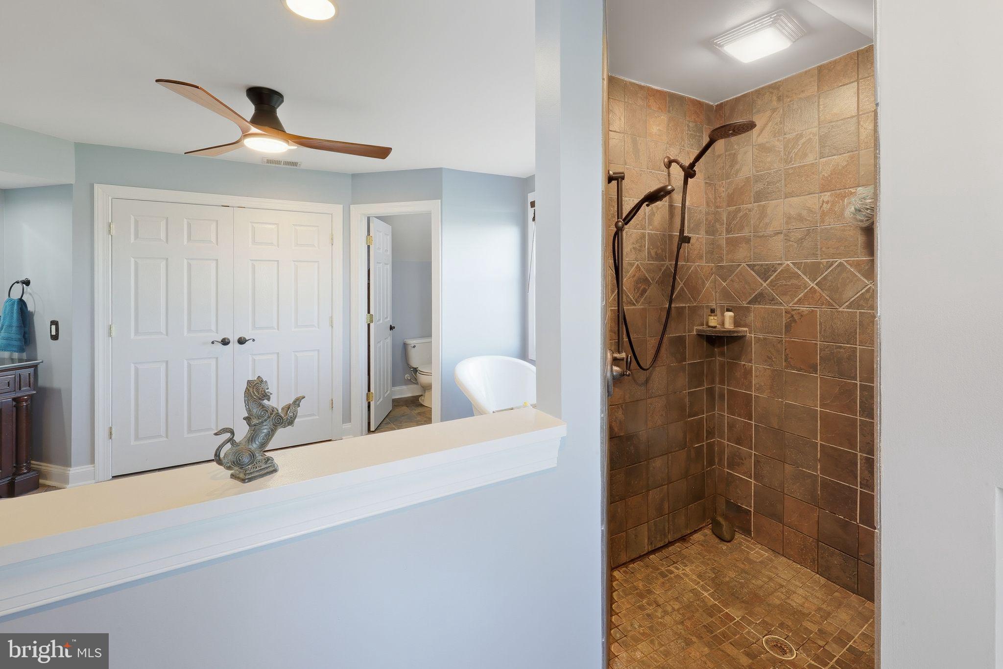 121 Little Eagle Road Centreville, MD 21617 - Photo 43 of 64 a bathroom with a sink and a mirror