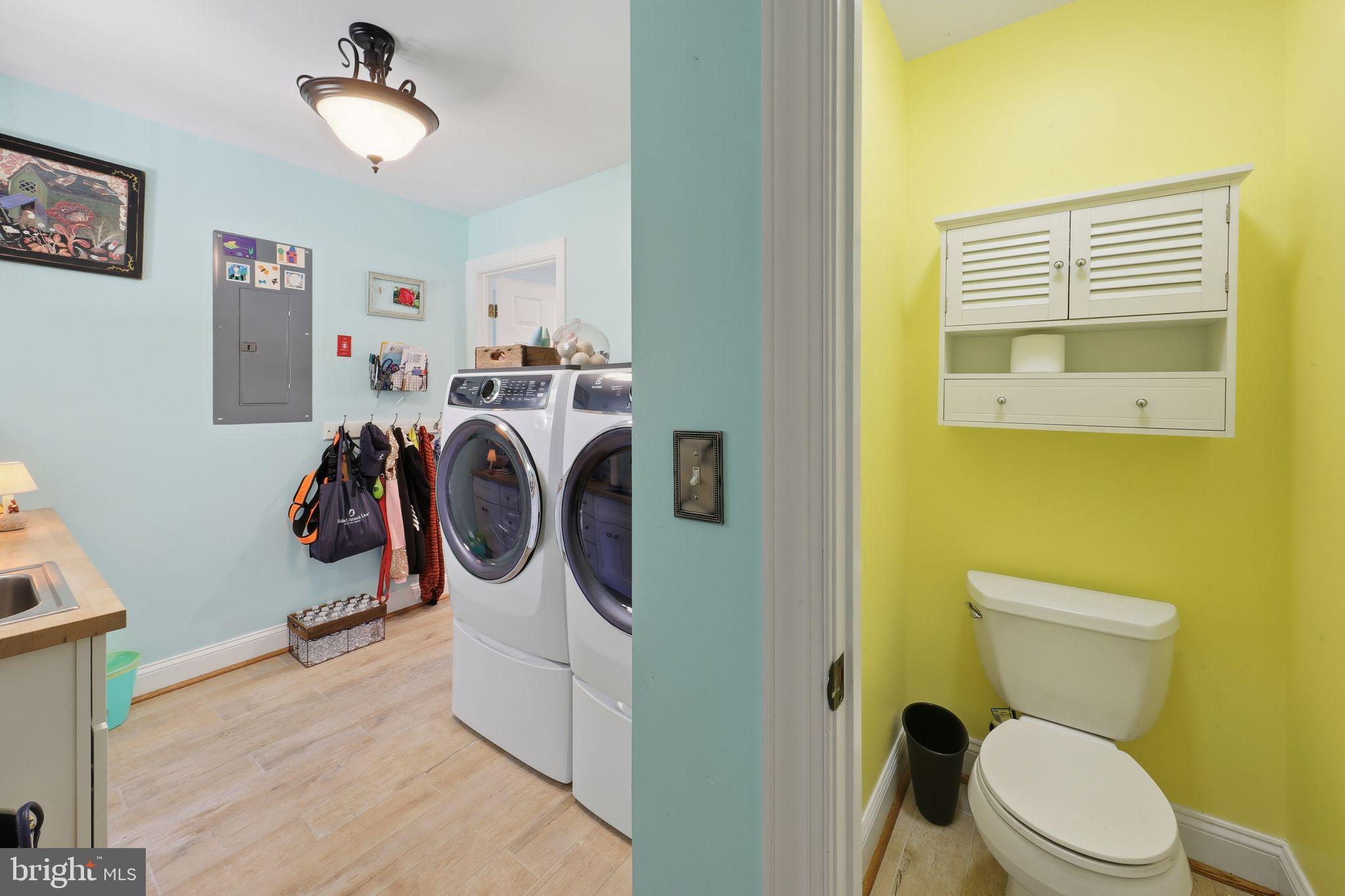 121 Little Eagle Road Centreville, MD 21617 - Photo 46 of 64 a bathroom with a sink a toilet and a mirror