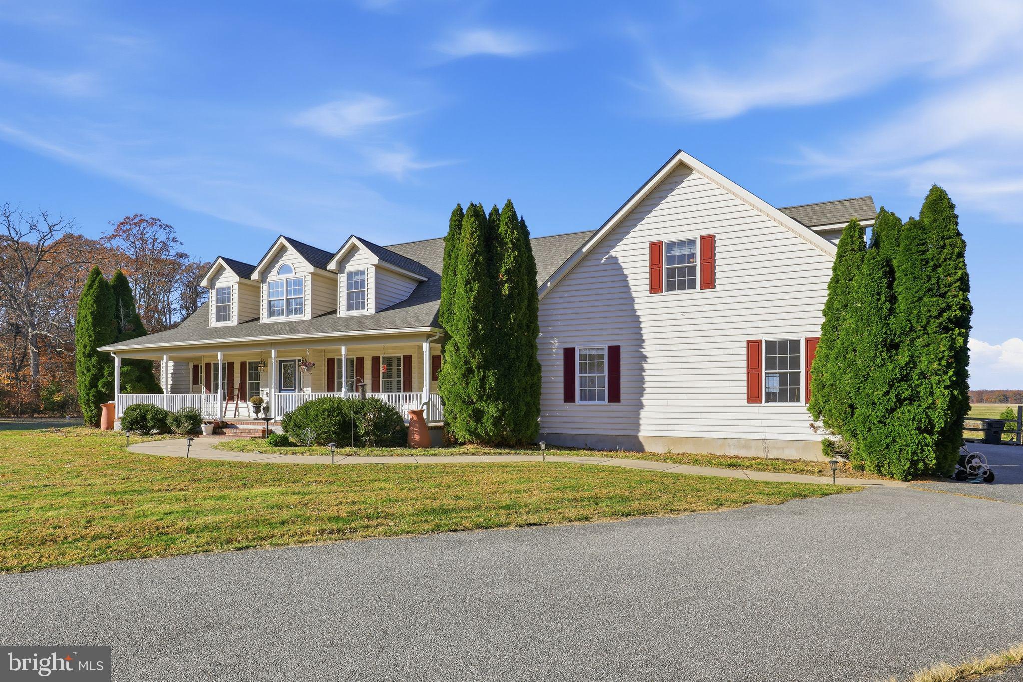 121 Little Eagle Road Centreville, MD 21617 - Photo 5 of 64 a front view of a house with a yard