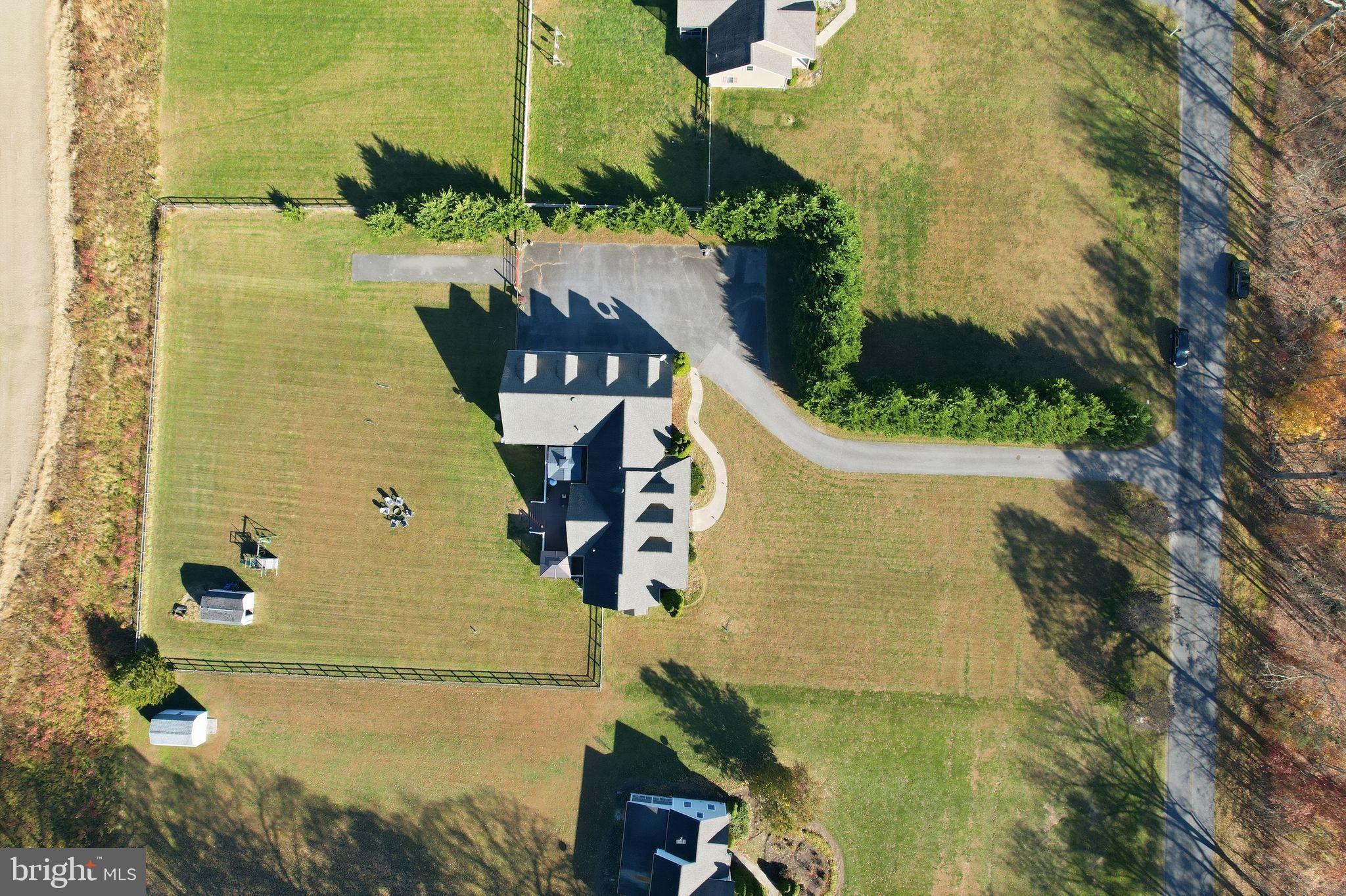 121 Little Eagle Road Centreville, MD 21617 - Photo 61 of 64 an aerial view of residential houses with outdoor space