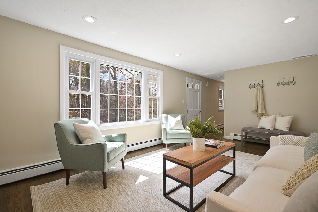 28 Hadley Road Sudbury, MA 01776 - Photo 11 of 30 a living room with furniture and a window