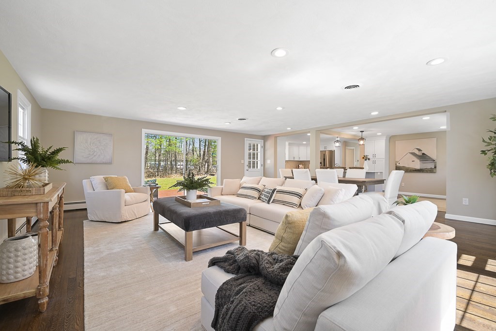 28 Hadley Road Sudbury, MA 01776 - Photo 2 of 30 a living room with furniture and a large window