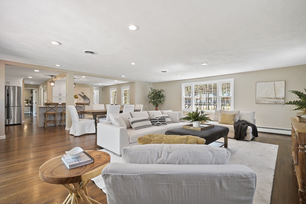 28 Hadley Road Sudbury, MA 01776 - Photo 3 of 30 a living room with furniture and a table