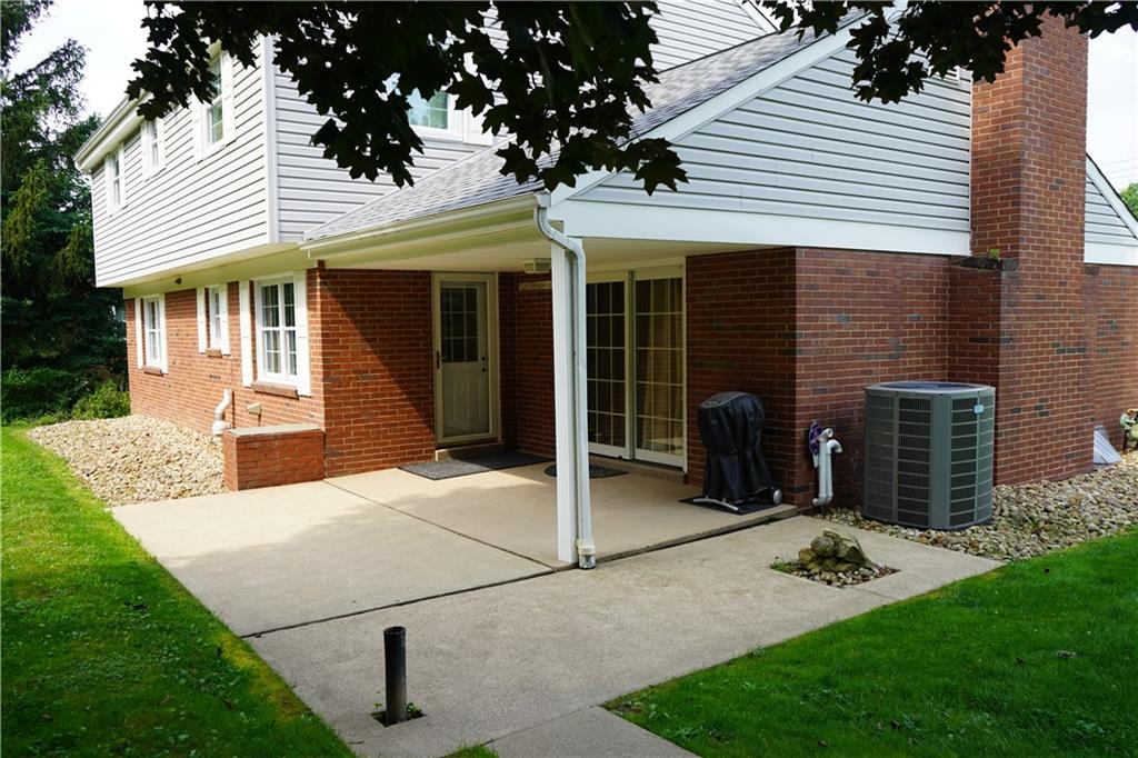 8372 Post Road Allison Park, PA 15101 - Photo 5 of 9 a front view of a house with garden