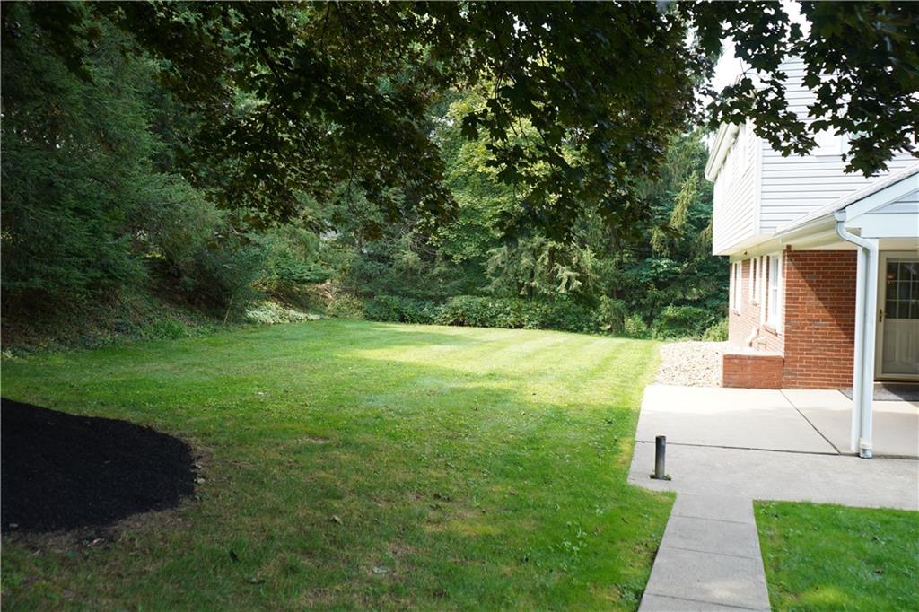 8372 Post Road Allison Park, PA 15101 - Photo 7 of 9 a view of a white house with a yard