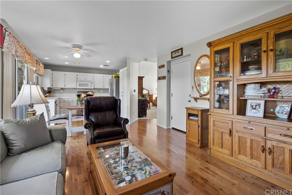 27710 Kristin Lane Saugus, CA 91350 - Photo 13 of 32 a living room with furniture and a rug