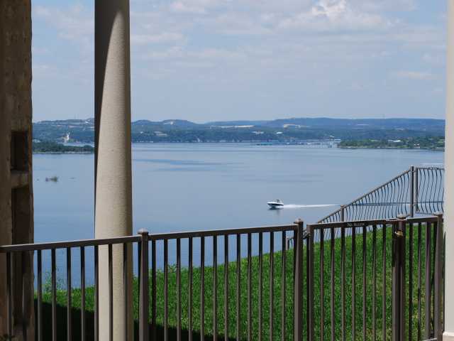 a view of balcony with furniture