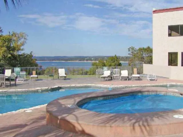 a view of a swimming pool with an outdoor space