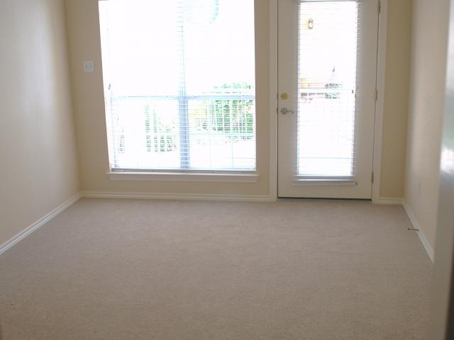 2918 Ranch Road 620, Unit 172 Austin, TX 78734 - Photo 7 of 18 an empty room with a window