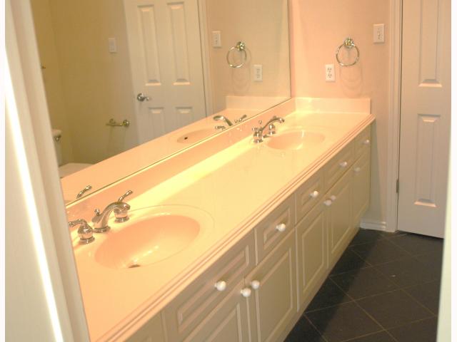 2918 Ranch Road 620, Unit 172 Austin, TX 78734 - Photo 8 of 18 a bathroom with a bathtub and a sink
