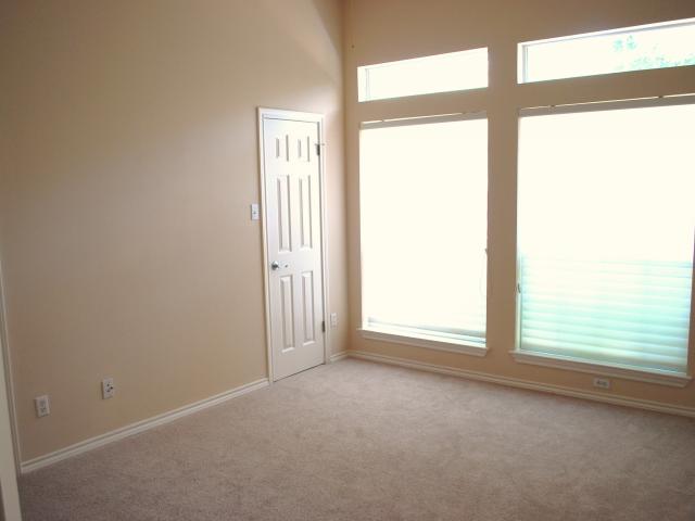 2918 Ranch Road 620, Unit 172 Austin, TX 78734 - Photo 9 of 18 a view of empty room with window