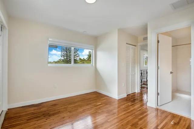 a view of livingroom with hardwood floor and hallway