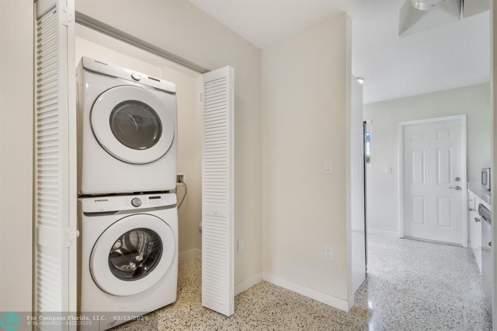 1001 Northeast 80th Street, Unit 4 Miami, FL 33138 - Photo 22 of 27 a utility room with dryer and washer