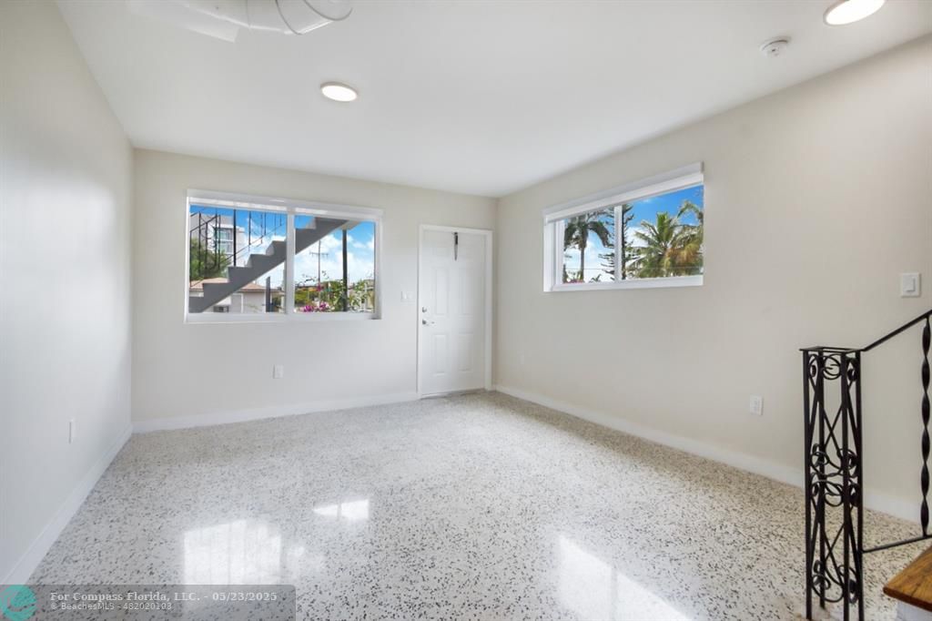 1001 Northeast 80th Street, Unit 4 Miami, FL 33138 - Photo 24 of 27 an empty room with windows