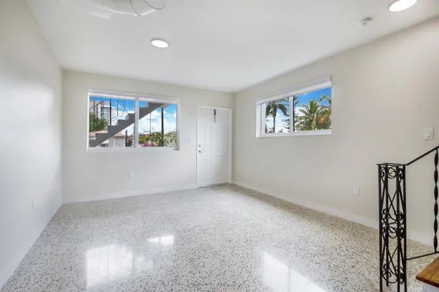 an empty room with windows