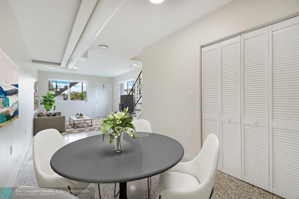 1001 Northeast 80th Street, Unit 4 Miami, FL 33138 - Photo 27 of 27 a dining room with furniture and wooden floor