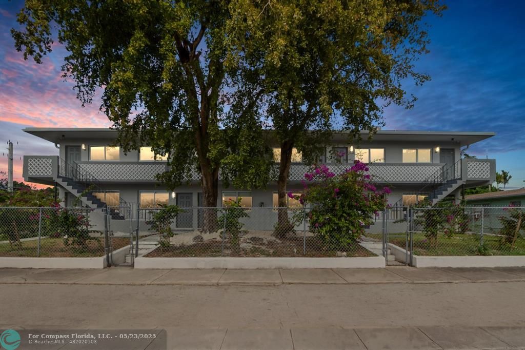 1001 Northeast 80th Street, Unit 4 Miami, FL 33138 - Photo 3 of 27 a front view of a house