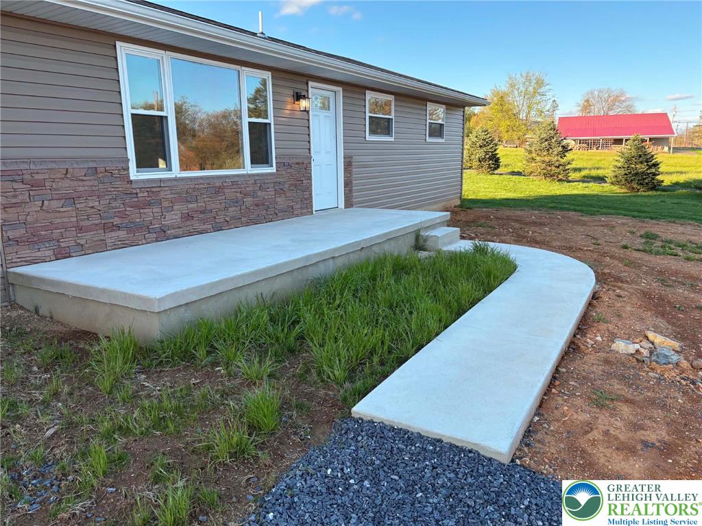 3957 Mountain Road Slatington, PA 18080 - Photo 1 of 33 a backyard of a house with lots of green space