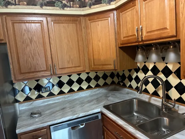 a kitchen with a stove and a microwave