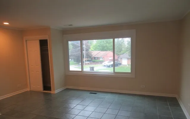 an empty room with windows