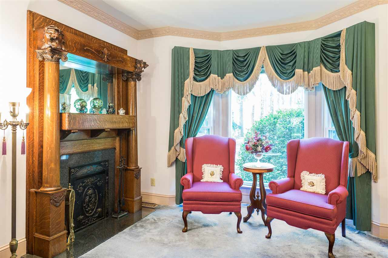 There are so many seating options for enjoying a nice cup of coffee in the morning! You have this sitting area with Bay window that overlooks the front yard, gorgeous Sunroom, Screened porch, Study, breakfast nook or in the Den next to a warm fire! Sitting Parlor