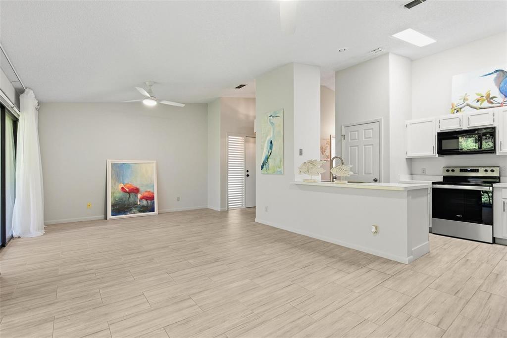 32 Navarra Court St. Augustine, FL 32086 - Photo 11 of 51 a view of an empty room with kitchen and a window