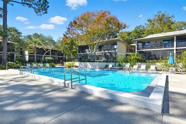 a view of outdoor space yard and swimming pool