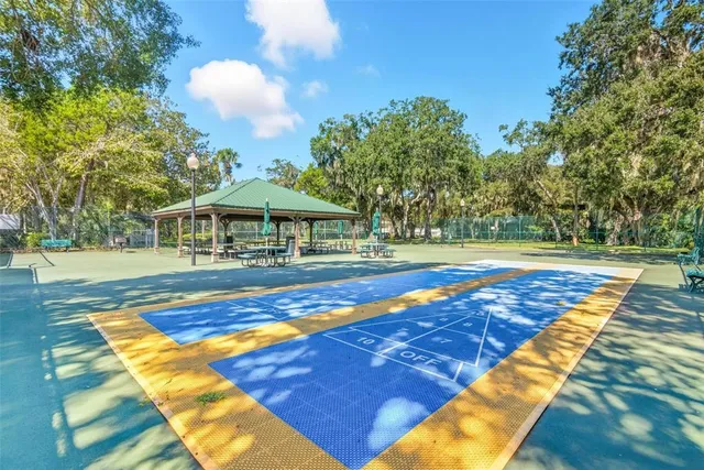 a view of a car parked in front of a house