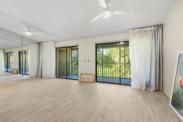 a view of a kitchen cabinets and wooden floor