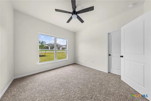 a view of a livingroom with a window