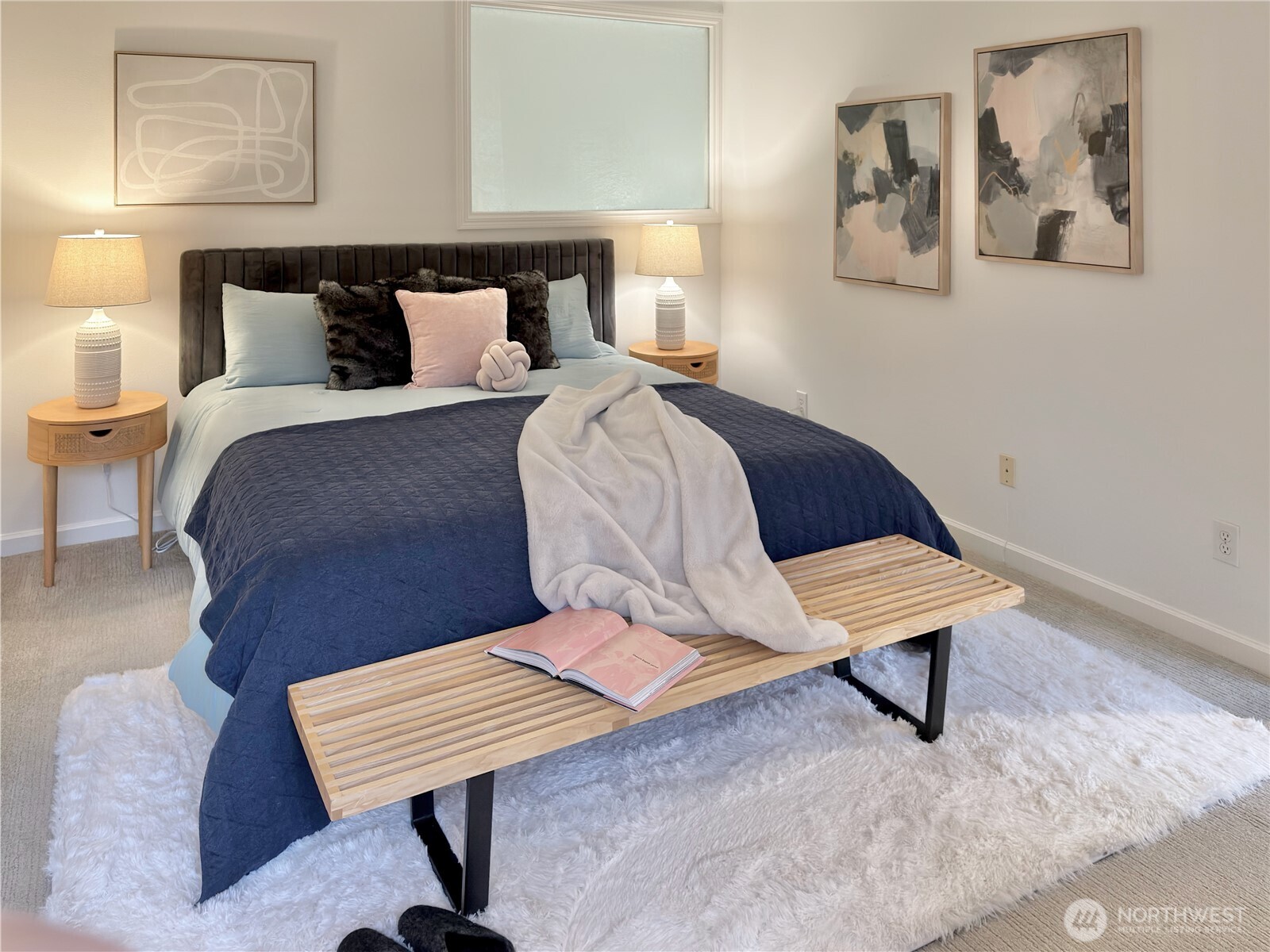 210 10th Street, Unit 4 Kirkland, WA 98033 - Photo 16 of 35 a bedroom with a bed and painting on the wall