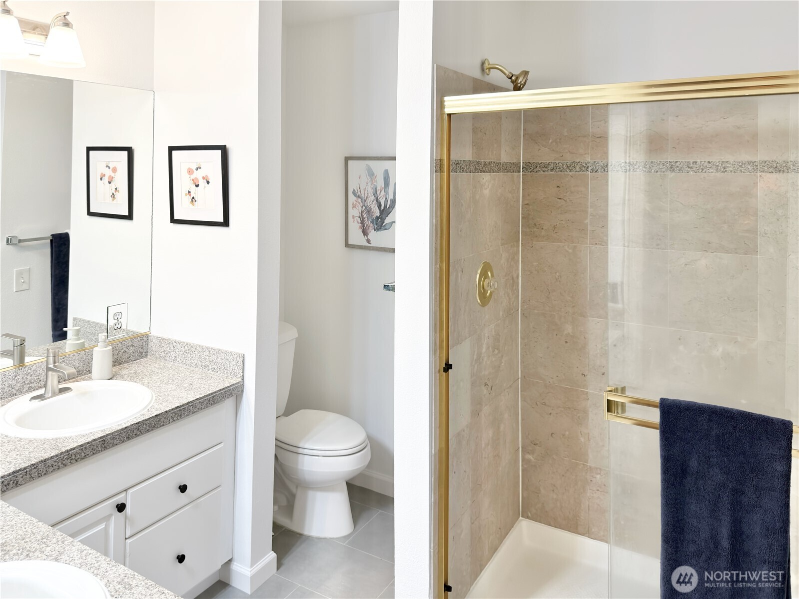 210 10th Street, Unit 4 Kirkland, WA 98033 - Photo 21 of 35 a bathroom with a sink a toilet and shower