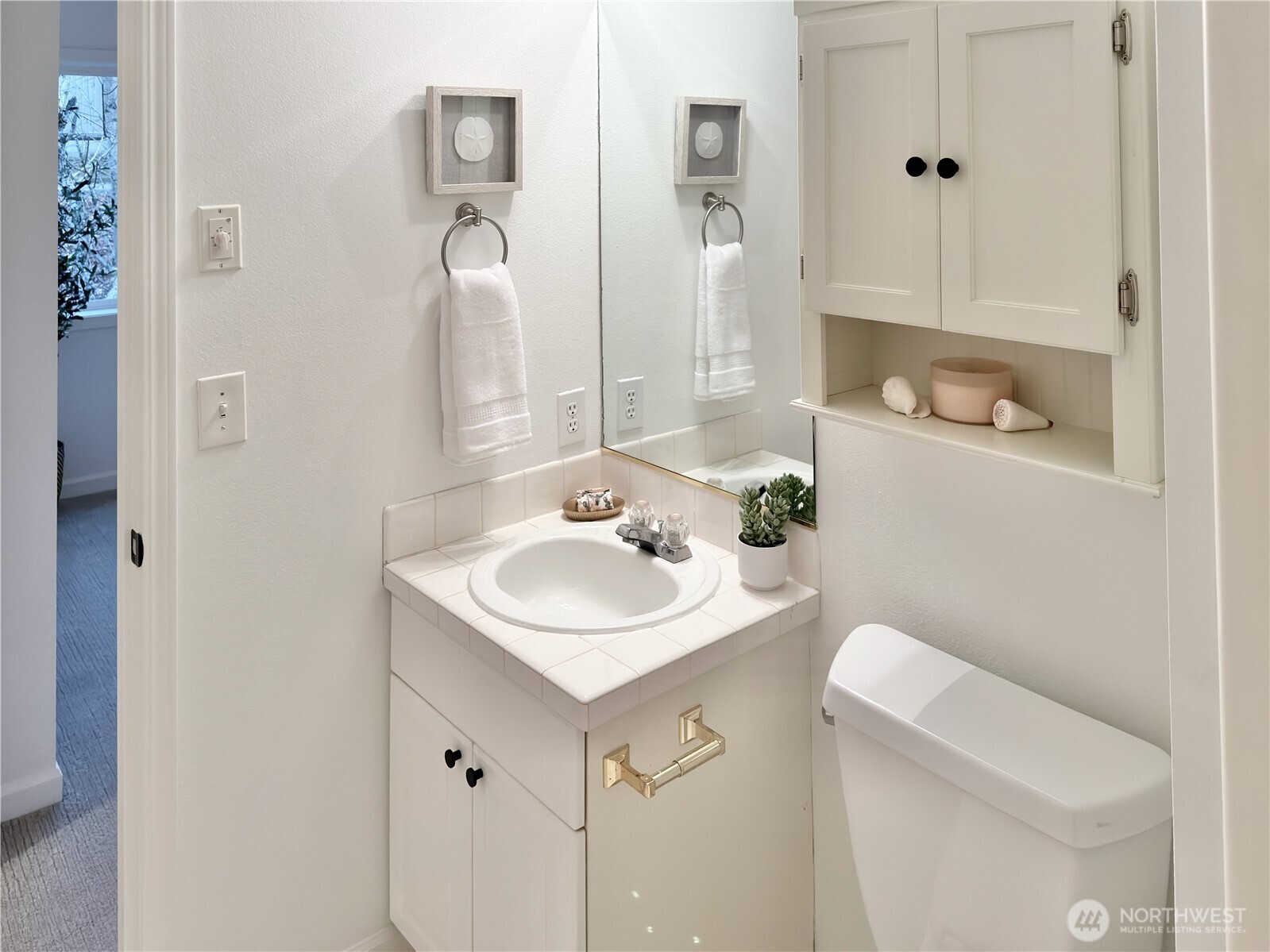 210 10th Street, Unit 4 Kirkland, WA 98033 - Photo 27 of 35 a bathroom with a sink and a toilet