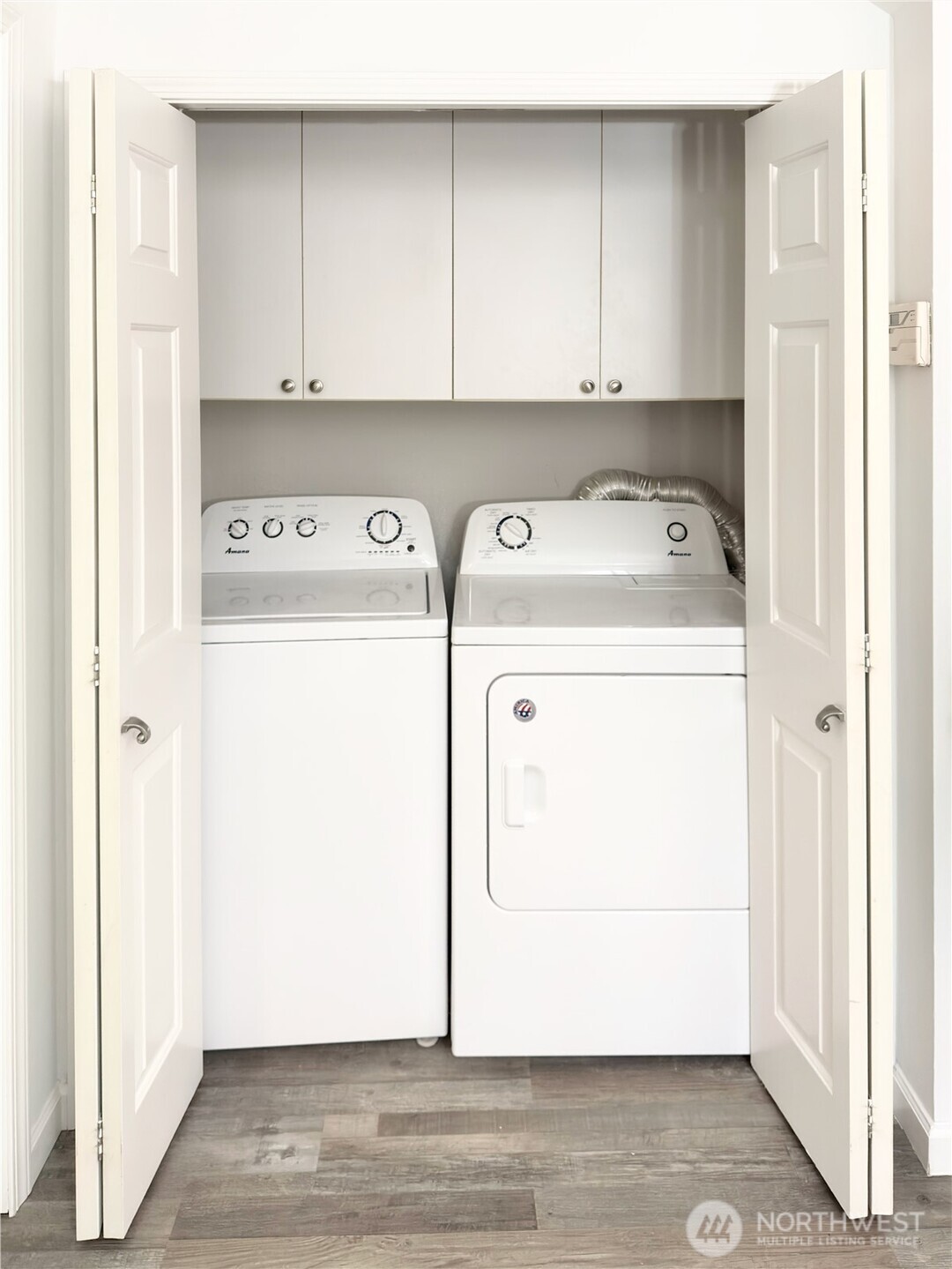 210 10th Street, Unit 4 Kirkland, WA 98033 - Photo 28 of 35 a utility room with dryer and washer
