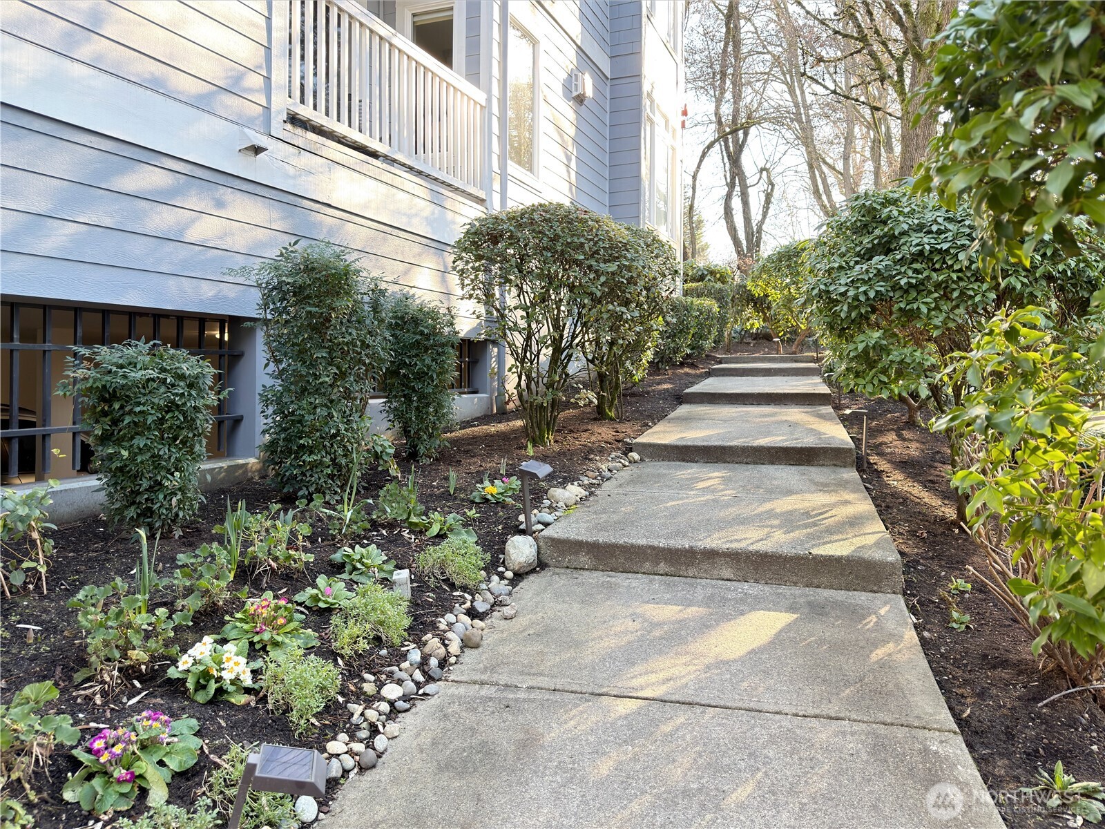210 10th Street, Unit 4 Kirkland, WA 98033 - Photo 35 of 35 a view of a pathway with a house