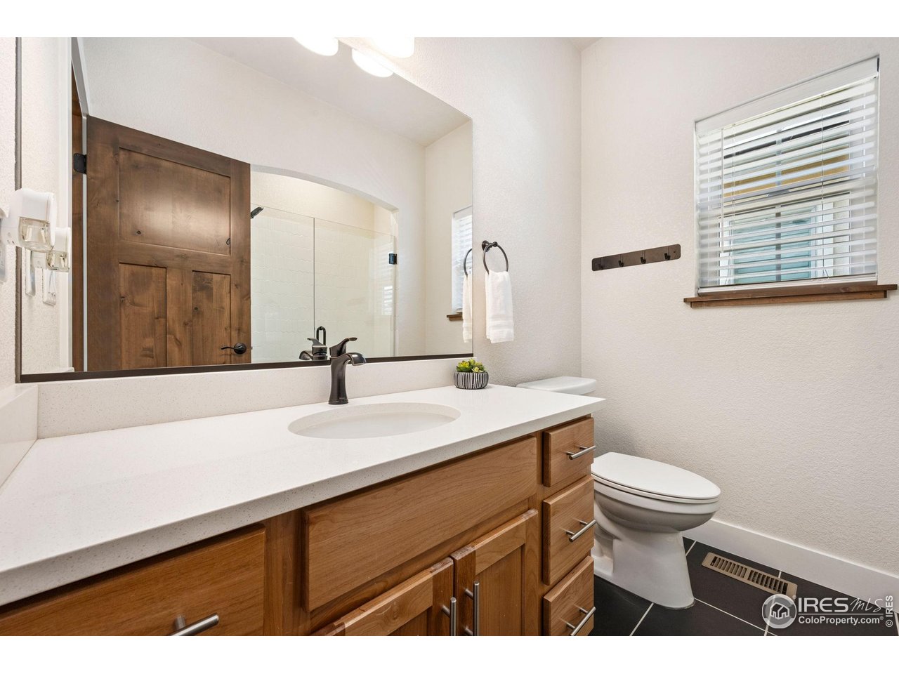 1442 Prairie Hawk Road Eaton, CO 80615 - Photo 18 of 40 Main Floor 3/4 Shared Bathroom