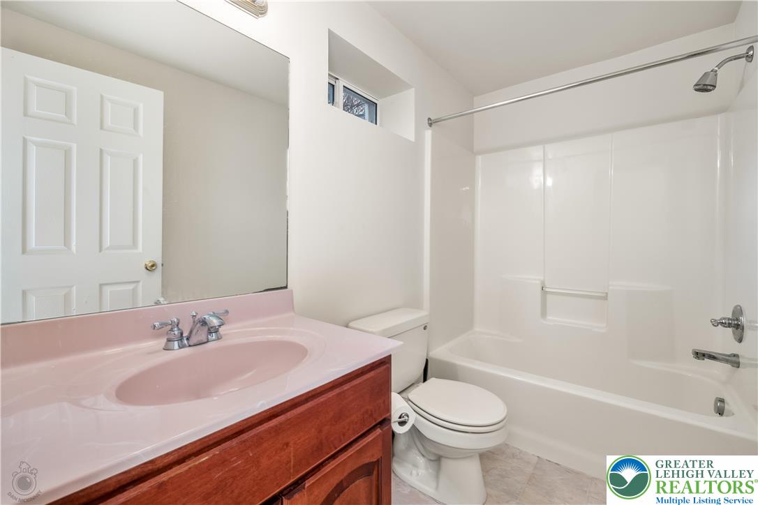 5 Farmstead Way Mount Bethel, PA 18343 - Photo 27 of 37 a bathroom with a sink a toilet and a bathtub