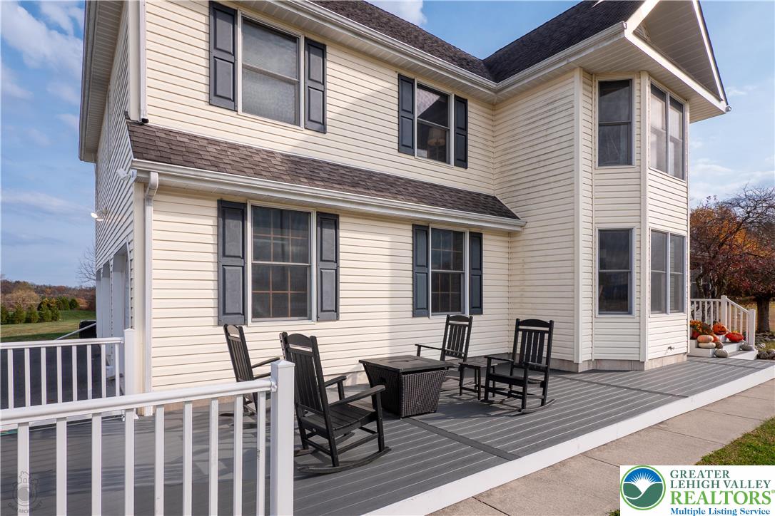5 Farmstead Way Mount Bethel, PA 18343 - Photo 29 of 37 a view of a house with a patio and a yard