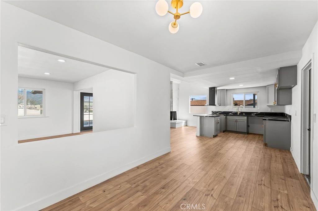 1423 Terrace Road Rialto, CA 92376 - Photo 11 of 40 a view of kitchen with wooden floor
