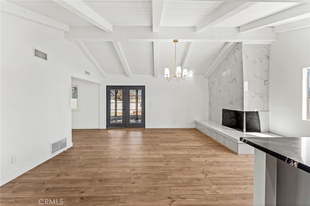 1423 Terrace Road Rialto, CA 92376 - Photo 13 of 40 a view of a livingroom with a kitchen counter tops and empty room