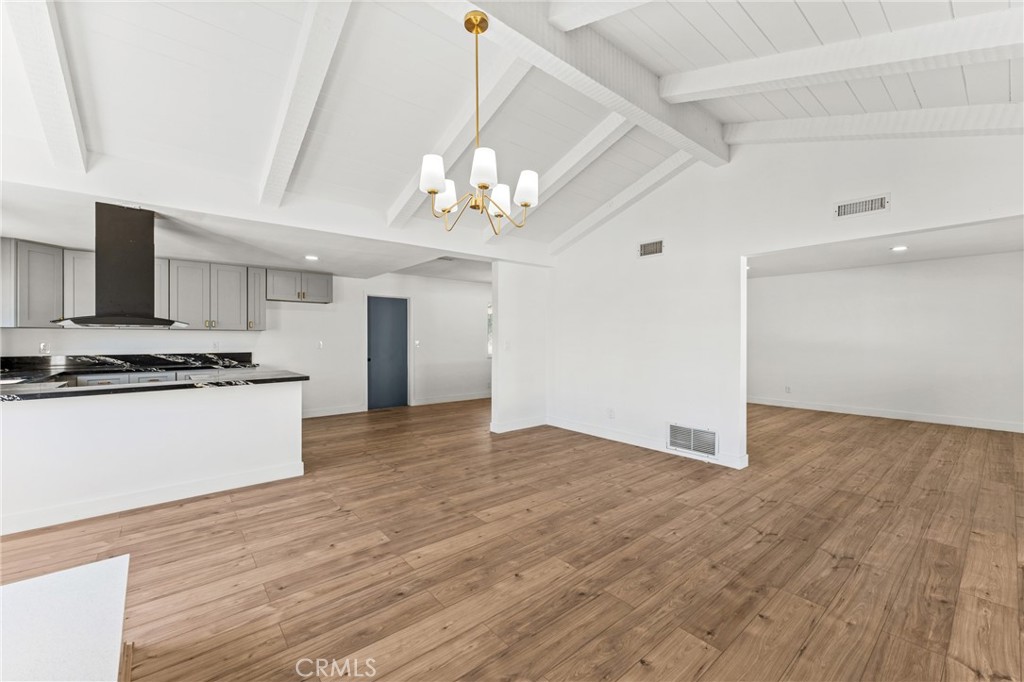 1423 Terrace Road Rialto, CA 92376 - Photo 15 of 40 a view of kitchen with granite countertop cabinets and refrigerator