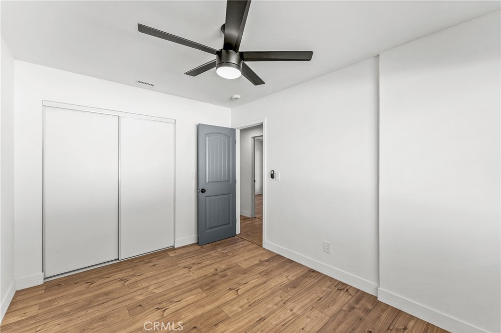 1423 Terrace Road Rialto, CA 92376 - Photo 28 of 40 a view of empty room with wooden floor