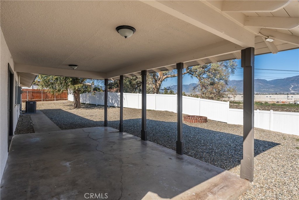 1423 Terrace Road Rialto, CA 92376 - Photo 36 of 40 a living room with large glass windows