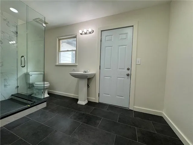 a view of a backyard of the house