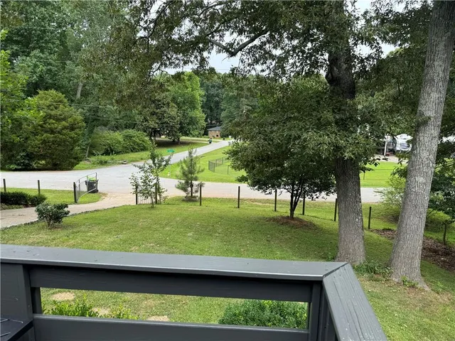 a view of outdoor sitting area with furniture