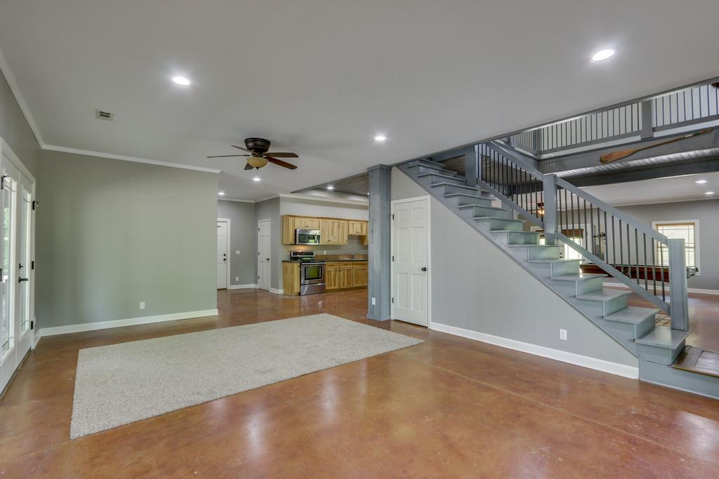 166 East Piney Road Dickson, TN 37055 - Photo 4 of 30 a view of a livingroom with a ceiling fan
