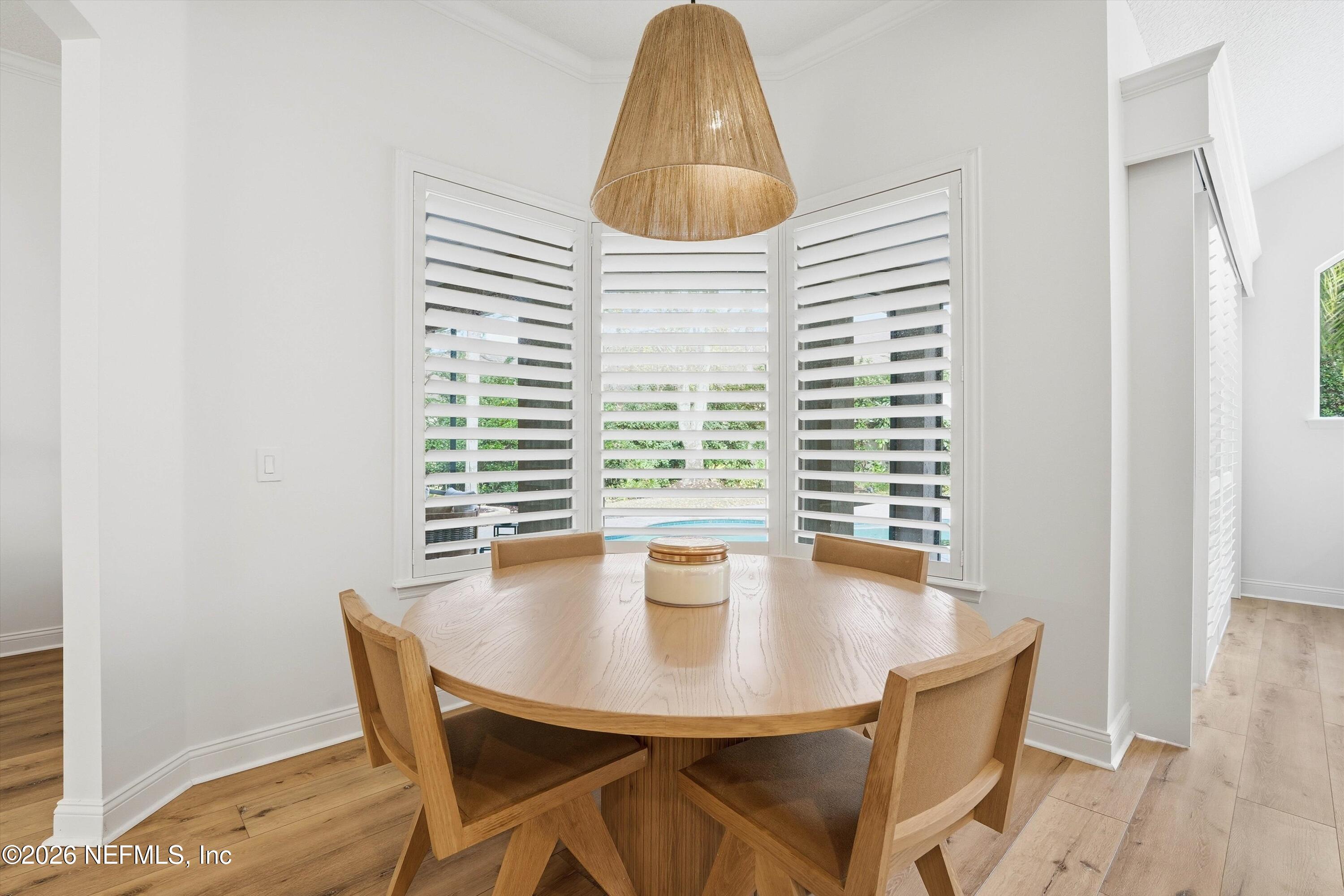 628 Pelham Road St. Augustine, FL 32092 - Photo 11 of 56 a dining room with furniture and window