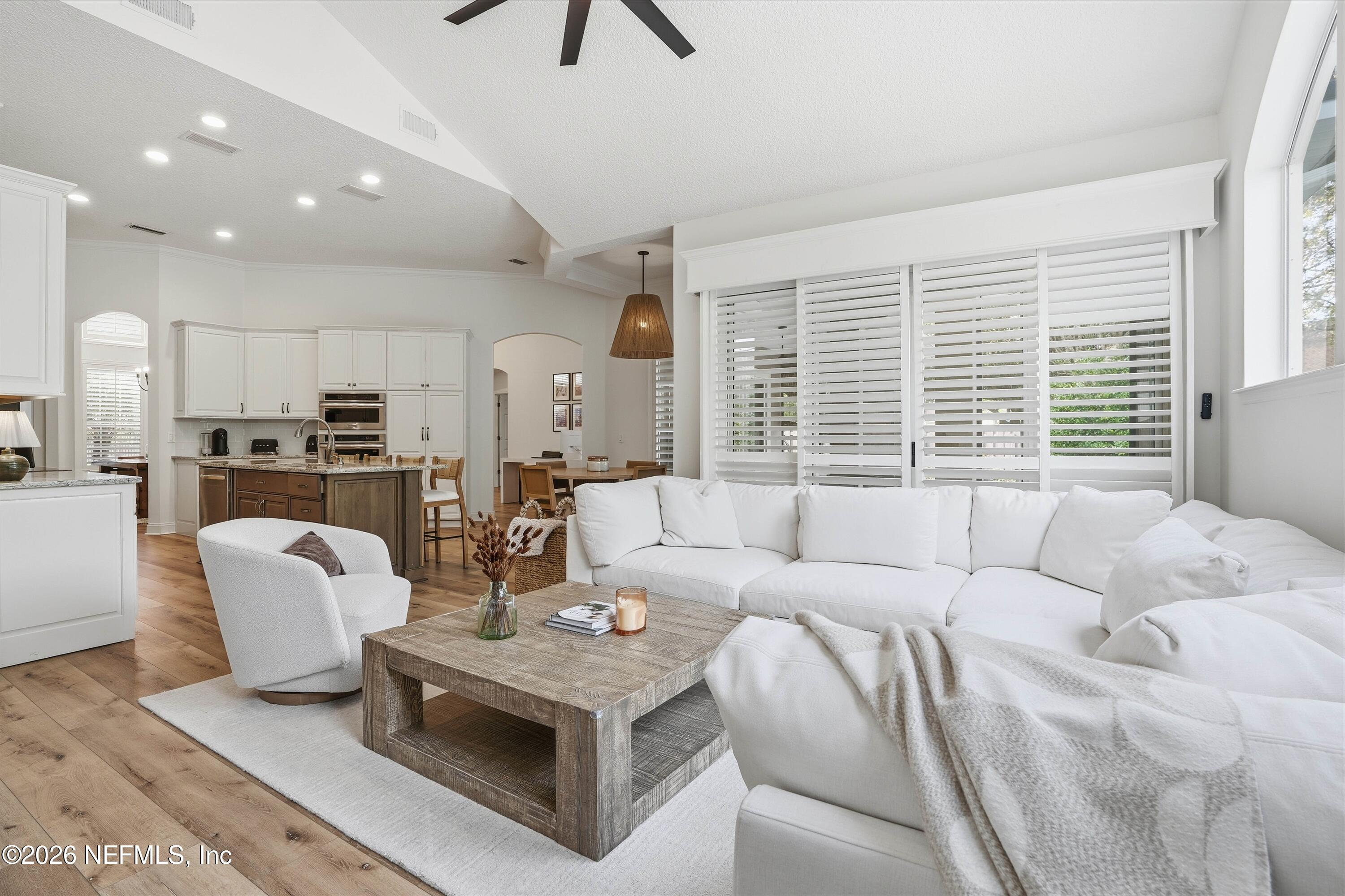 628 Pelham Road St. Augustine, FL 32092 - Photo 15 of 56 a living room with furniture and a large window