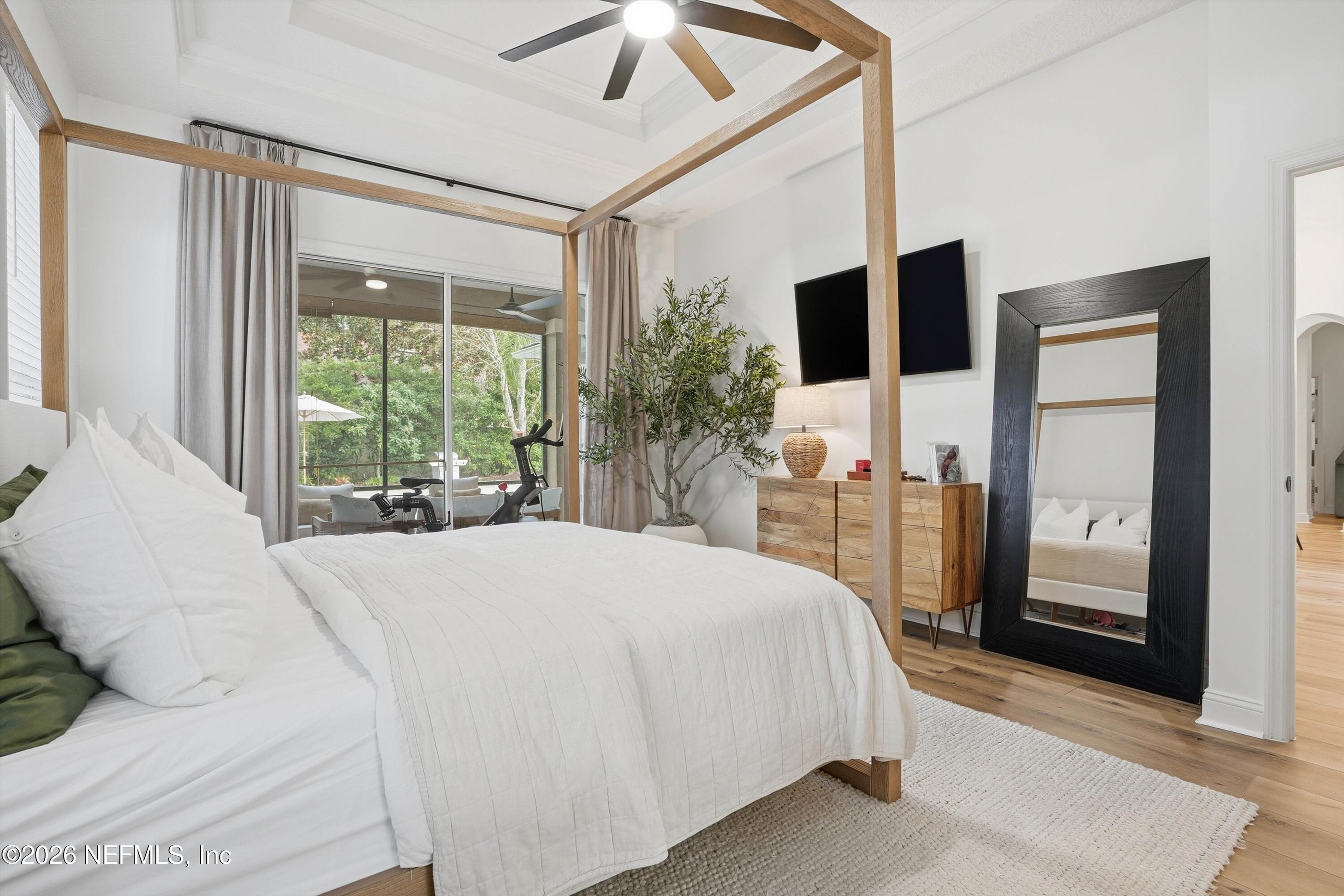 628 Pelham Road St. Augustine, FL 32092 - Photo 17 of 56 a bed sitting in a spacious bedroom next to a window